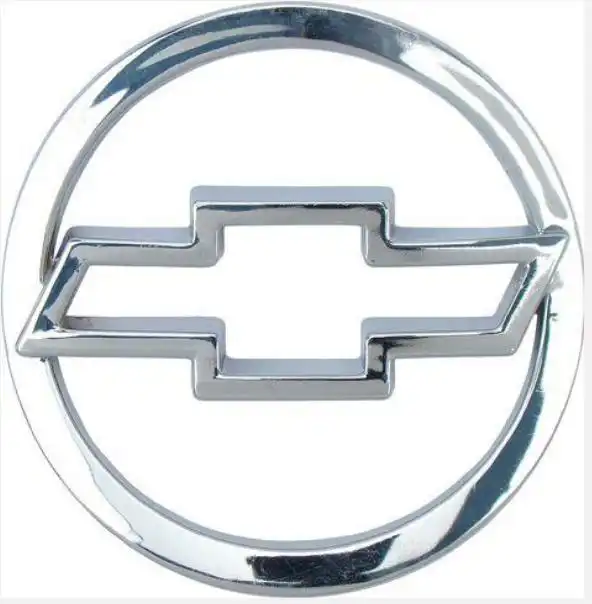 EMBLEMA TAMPA TRAS CORSA SEDAN 2002/ CROMADO