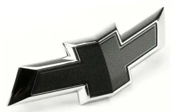 EMBLEMA ADESIVO GRADE/TAMPA TRAS CRUZE HATCH 12/ CARBONO