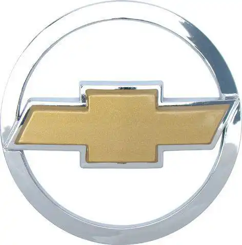 EMBLEMA TAMPA TRAS CELTA PRISMA 02/07 C/GRAVATA DOURADA