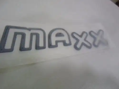 EMBLEMA PORTA MAXX CORSA 07/ PRISMA 08/